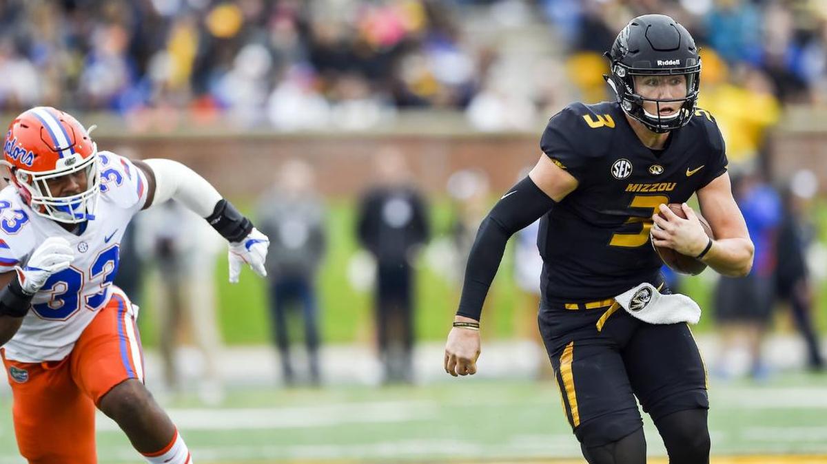 Missouri Tigers quarterback Drew Lock (3) ran for 35 yards and also threw for three touchdowns Saturday.