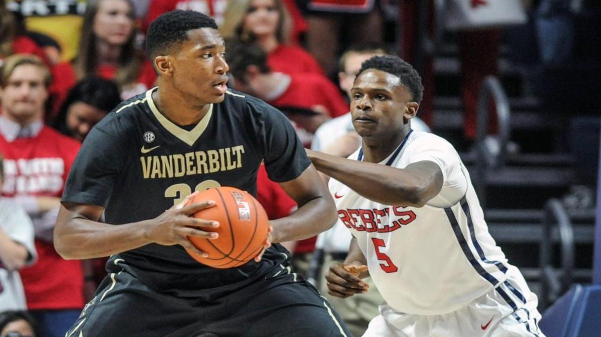 Vanderbilt’s Damien Jones (left), a junior who is 7 feet tall, faces the Missouri Tigers tonight on his home court in Nashville, Tenn. In Vanderbilt’s game against Mississippi on Feb. 6, he was guarded by Marccanvis Hymon.