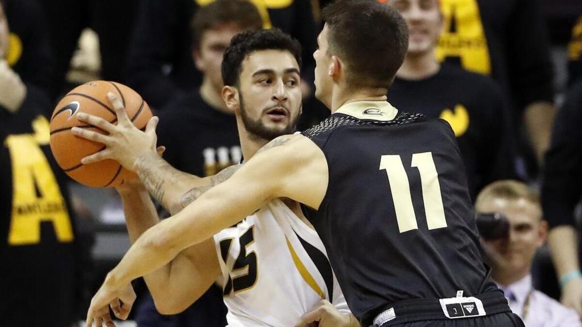 Missouri's Jordan Geist (left) made his first start of the season Monday against Emporia State.