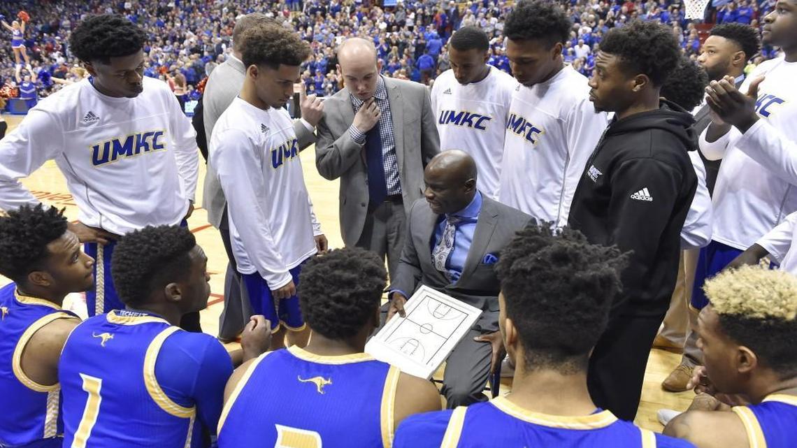 UMKC coach Kareem Richardson (middle) talks to his squad before a game in 2016.