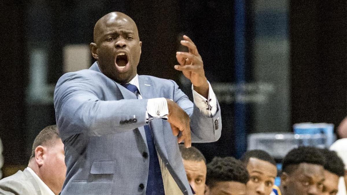 UMKC Kangaroos head coach Kareem Richardson communicated with his team on Wednesday during the College Basketball Invitational game against the Green Bay Phoenix at the Swinney Recreation Center on the campus of the University of Missouri-Kansas City.