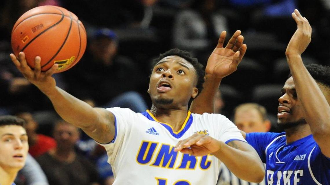 Martez Harrison (left) played six games for UMKC his senior season before he was dismissed from the team following a university investigation into a domestic violence allegation.