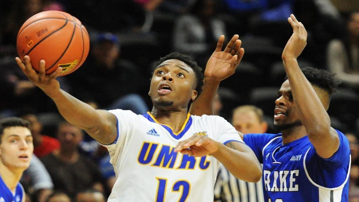 Former UMKC basketball player Martez Harrison (left)