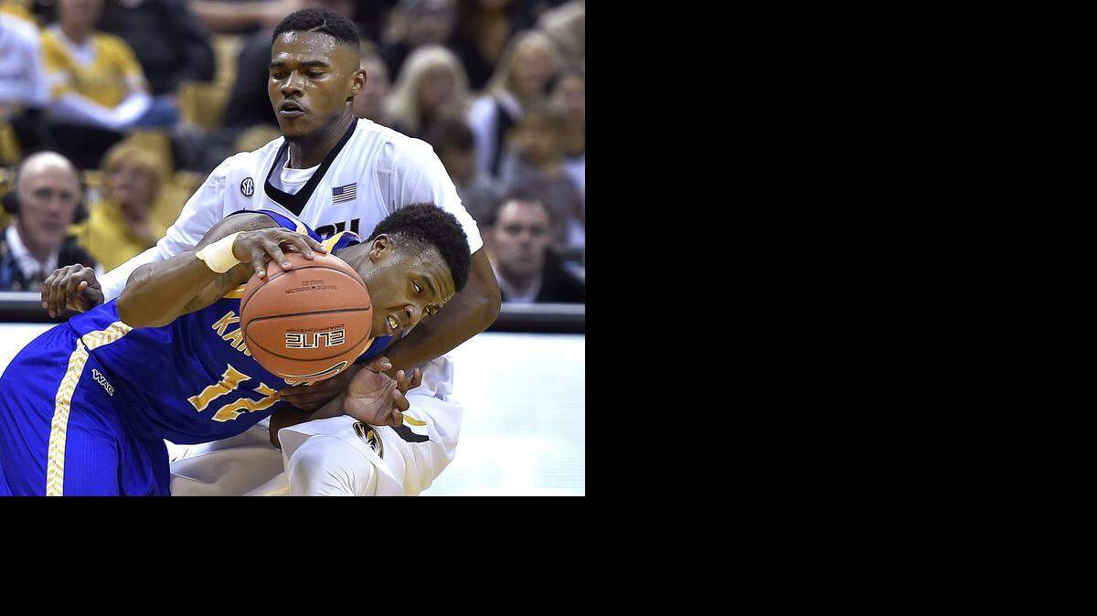 
Martez Harrison (with ball) and UMKC have won just three times since beating Keith Shamburger and Missouri in the first game of the season.
