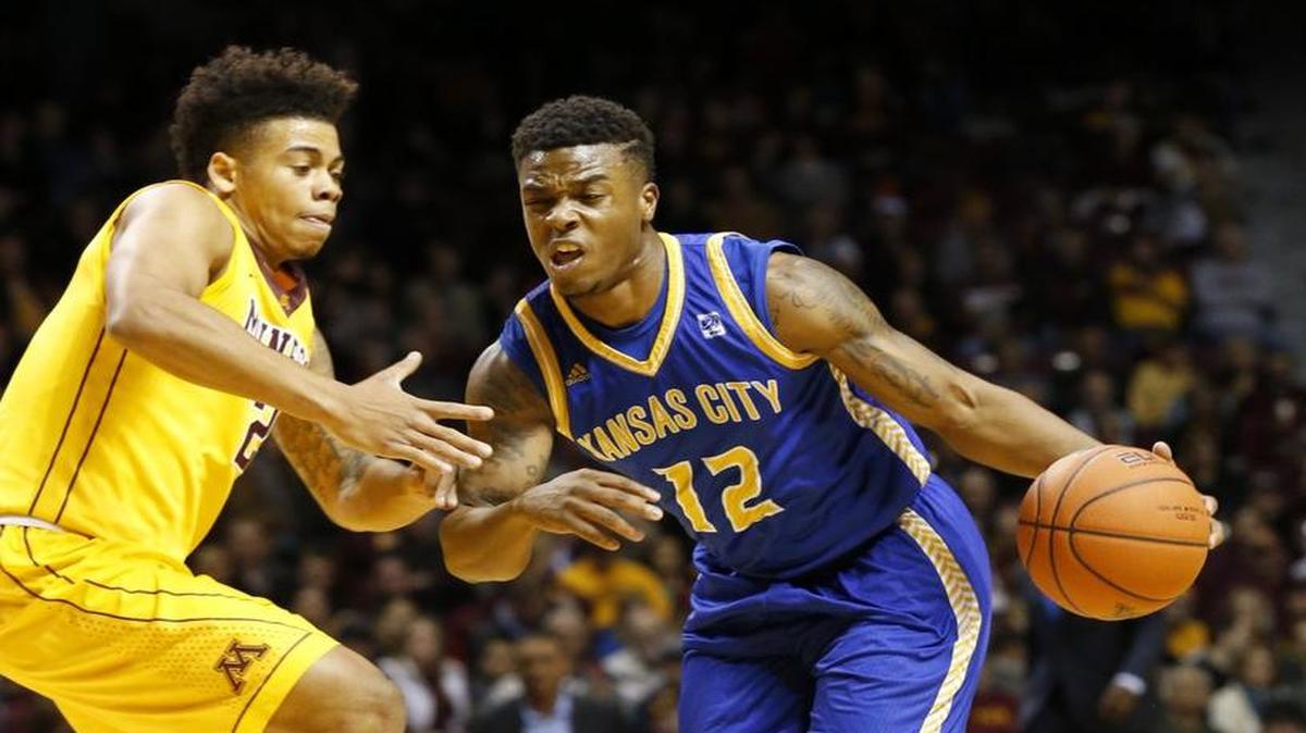 UMKC guard Martez Harrison (right).