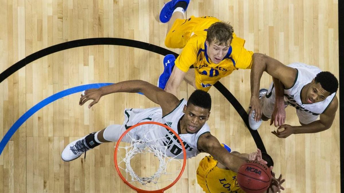 D'Vante Mosby (30) of Northwest Missouri grabbed the rebound against Nebraska-Kearney during the MIAA championship game at the Municipal Auditorium.
