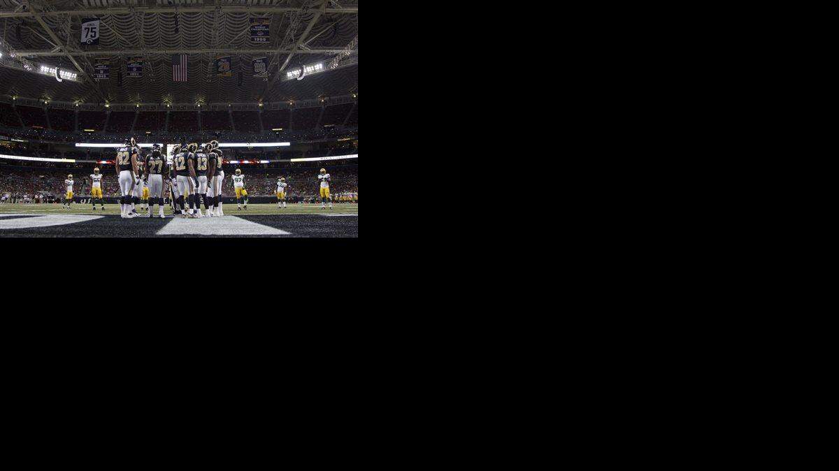 In this Aug. 16, 2014, members of the St. Louis Rams huddle in an end zone inside Edward Jones dome during the fourth quarter of an NFL preseason football game against the Green Bay Packers in St. Louis. Missouri Gov. Jay Nixon has asked a former Anheuser-Busch executive and a prominent attorney to consider options for ensuring the future of the NFL in St. Louis. Nixon announced Wednesday, Nov. 5, 2014, that former brewery president David Peacock and attorney Robert Blitz will analyze the stadium issue involving the St. Louis Rams, then present options within 60 days.