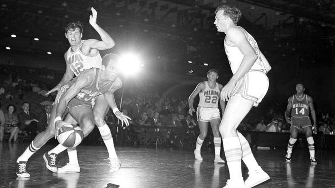 Don Dee (front) spent one season, 1968-69, with the Indiana Pacers in the ABA after the Olympics.<252><137>(43) of the Indiana Pacers drives past Gary Keller of the Miami Floridians to sink a layup shot during ABA action in Miami, Fla., Dec. 2, 1968. (AP Photo/Toby Massey)<252><137>