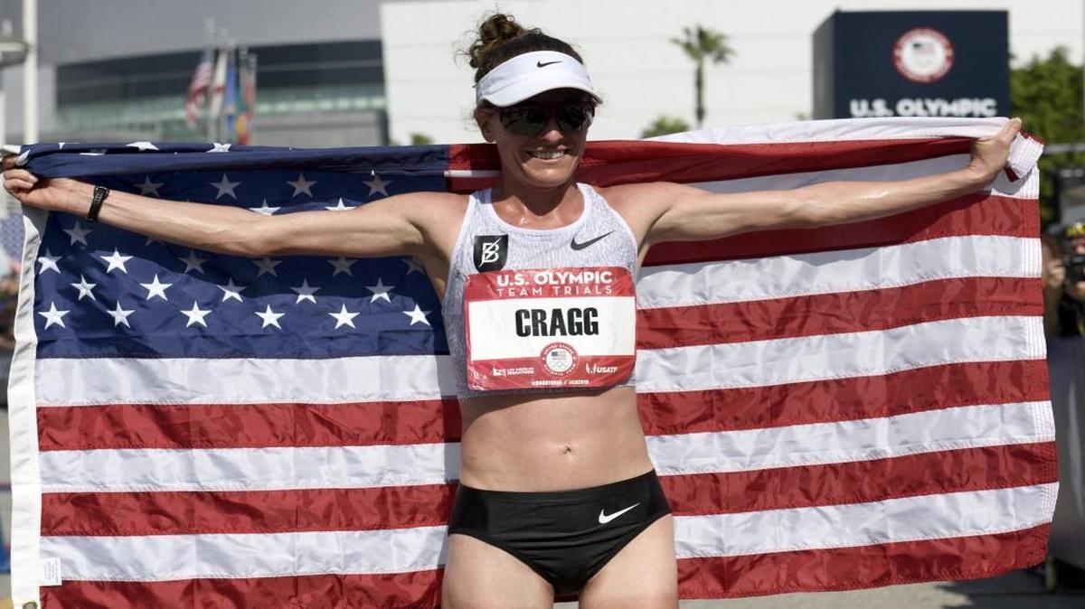 Amy Cragg posed with the United States flag after the U.S. Olympic marathon trials on Saturday in Los Angeles.