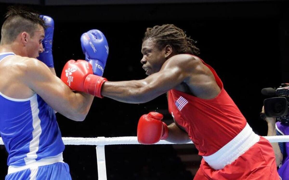 
Cam Awesome (right), who lives in Lenexa, beat Canada’s Simon Kean in a men's superheavyweight bout at the Pan Am Games boxing competition on July 19, 2015, in Oshawa, Ontario, Canada.
