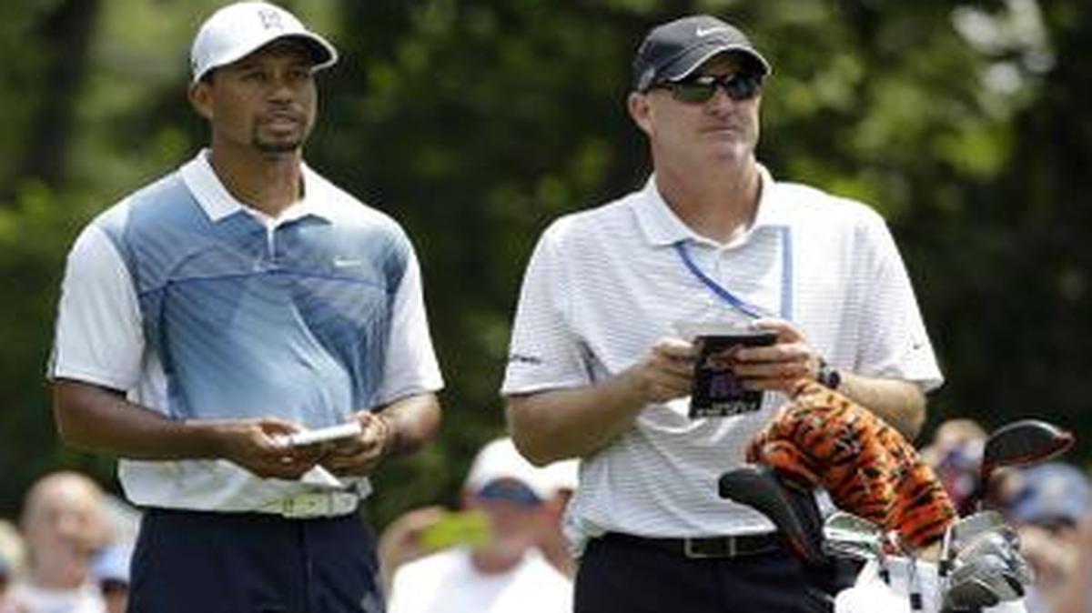 
Tiger Woods (left) and caddy Joe LaCava chatted on the second tee during a practice round for the PGA Championship golf tournament at Valhalla Golf Club on Wednesday in Louisville, Ky. 
