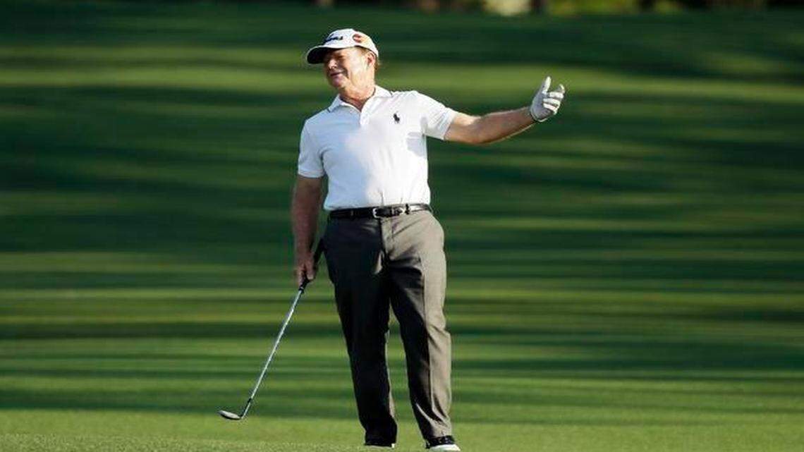 
Tom Watson reacts to his shot on the second fairway during the first round of the Masters golf tournament Thursday, April 9, 2015, in Augusta, Ga. 
