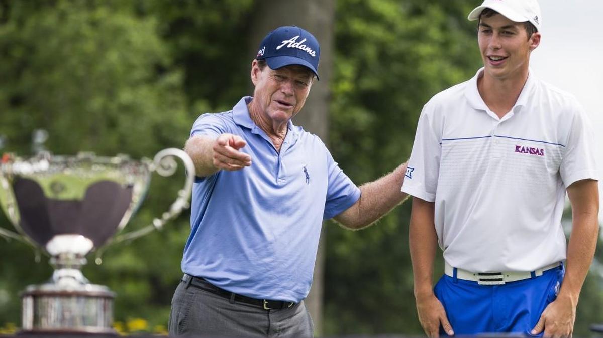 Tom Watson (left) presented the trophy to Chase Hanna after Hanna won the 20015 Watson Challenge at Mission Hills Country Club.