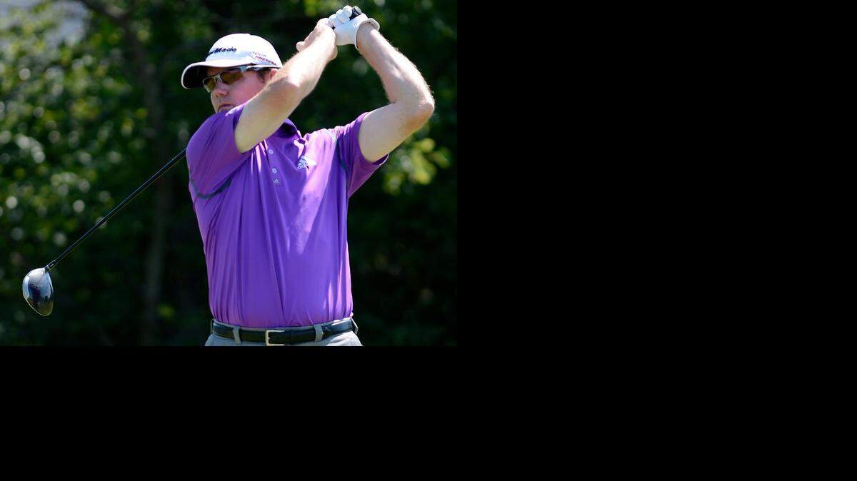 
Shaun Micheel hits a tee shot during Thursday's round of the Midwest Classic at the Nicklaus Golf Club at Lionsgate. Micheel finished with a 2-over 73.
