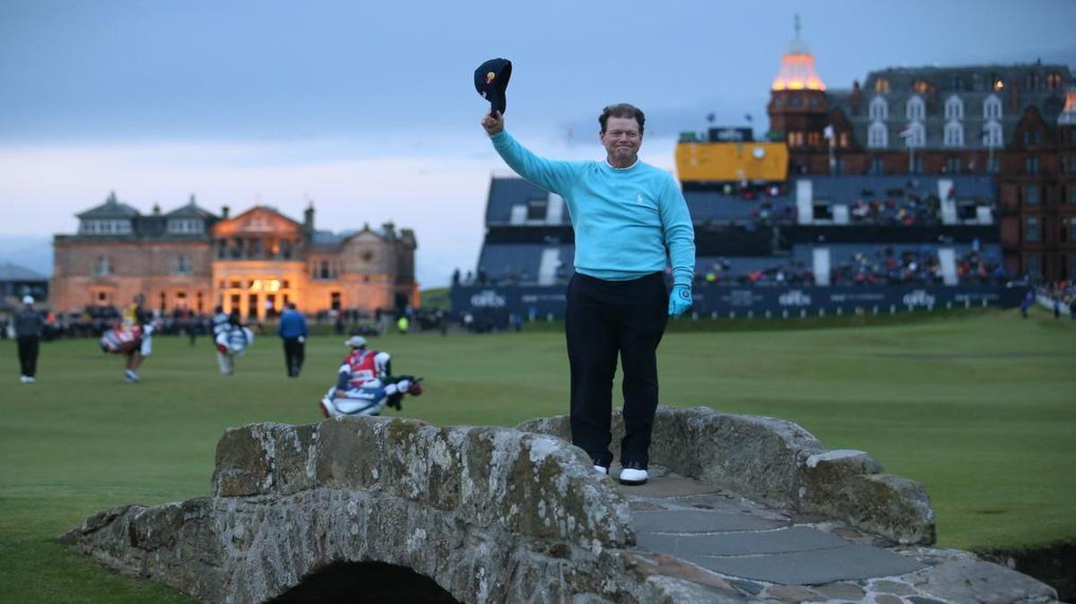 
United States’ Tom Watson doffed his cap as he posed on the Swilcan Bridge for photographers during the second round of the British Open Golf Championship at the Old Course, St. Andrews, Scotland, on Friday.
