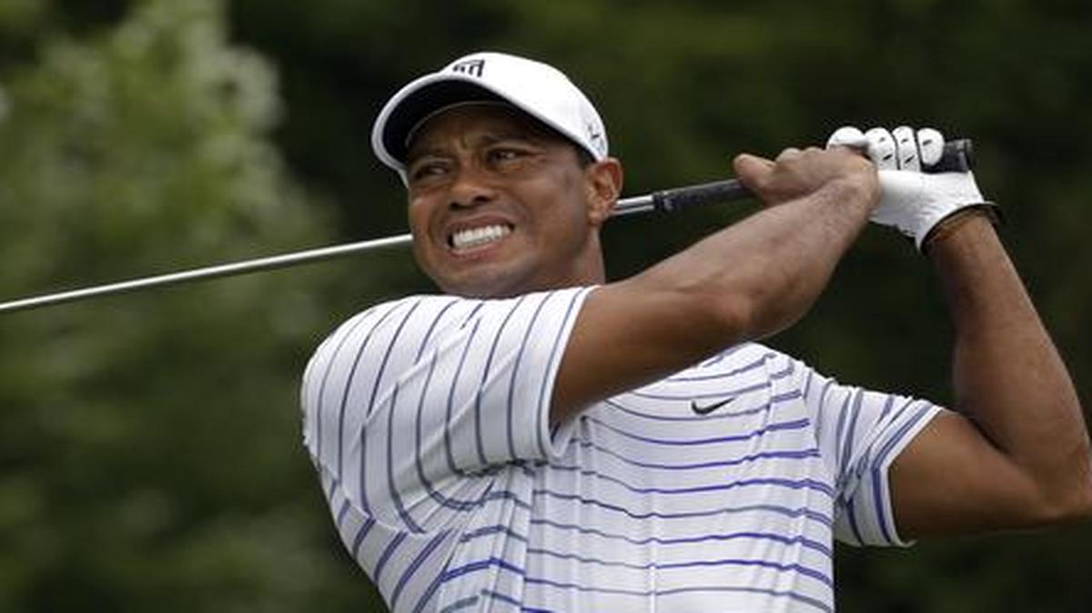 
Tiger Woods winces after his tee shot on the sixth hole during the second round of the PGA Championship golf tournament at Valhalla Golf Club Friday
