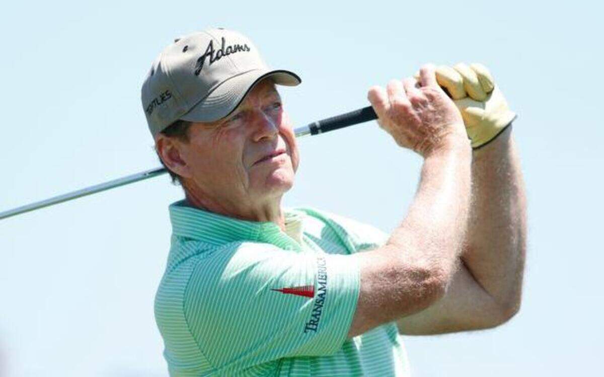 
Tom Watson hits a tree shot on the third hole during the final round of the 75th Senior PGA Championship golf tournament at Harbor Shores Golf Club in Benton Harbor, Mich., Sunday, May 25, 2014.
