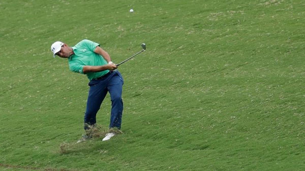 Gary Woodland hits from the rough on the 18th hole during the second round of the PGA Championship in Charlotte, N.C.