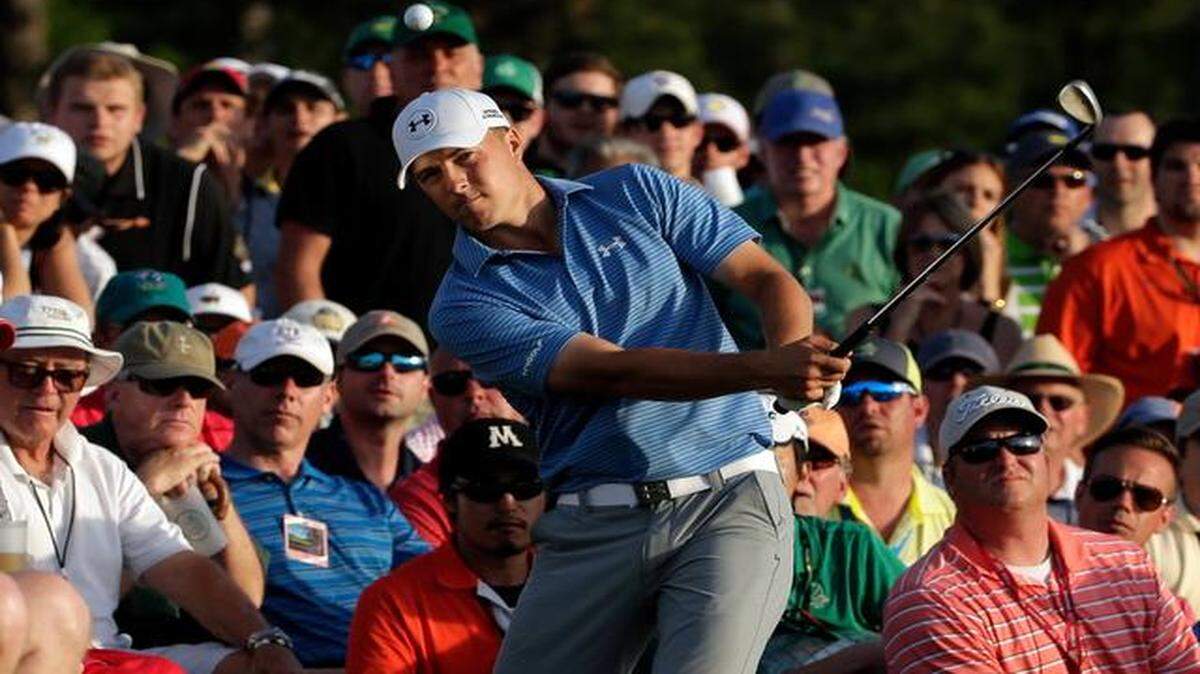 
Jordan Spieth hit out of the gallery on the 18th hole during the third round of the Masters golf tournament Saturday in Augusta, Ga. 
