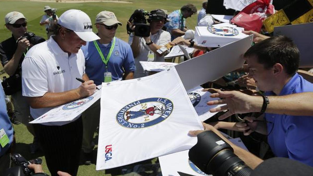 
Phil Mickelson was popular with fans trying to get autographs after his practice round Tuesday in Pinehurst, N.C.
