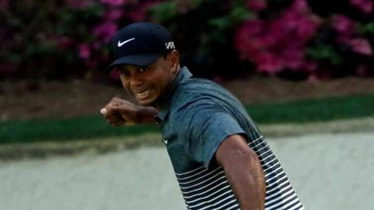 
Tiger Woods gave a familiar fist pump after making a birdie on the 13th hole during the third round of the Masters golf tournament Saturday in Augusta, Ga.

