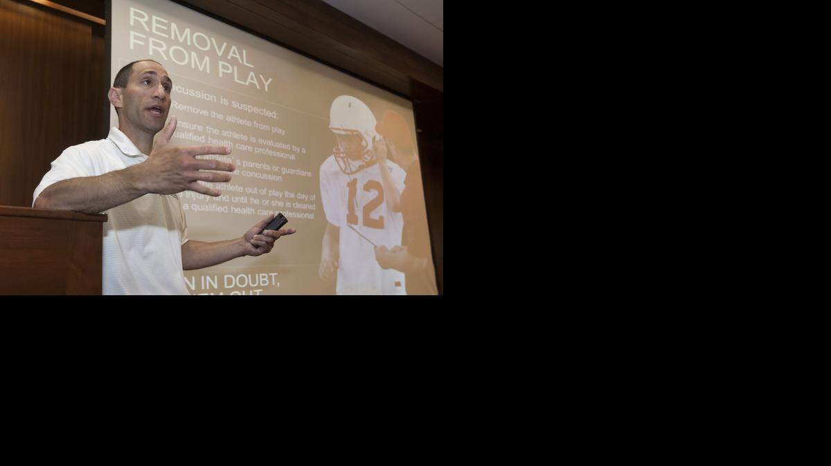 
Dr. Randy Goldstein, director of Youth Sports Medicine at the University of Kansas Hospital, spoke about concussions during the USA Football Heads Up Football Player Safety Clinic on Saturday at Arrowhead Stadium. About 100 coaches from youth through high school football programs attended the clinic.

