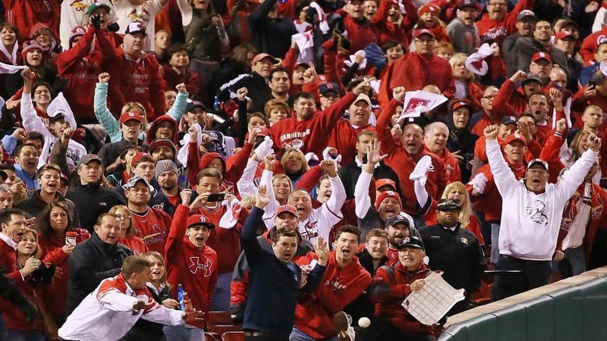 In this file photo, fans reacted at Busch Stadium. On Wednesday, a fan flashed the camera while appearing on the Jumbotron.