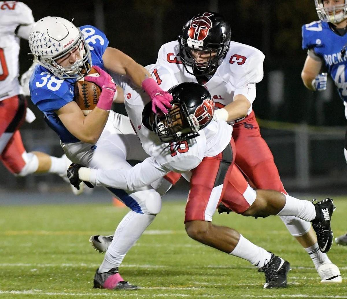 Park Hill cornerback Devin Haney, center, had five interceptions last season and broke a school record with 26 passes defended.