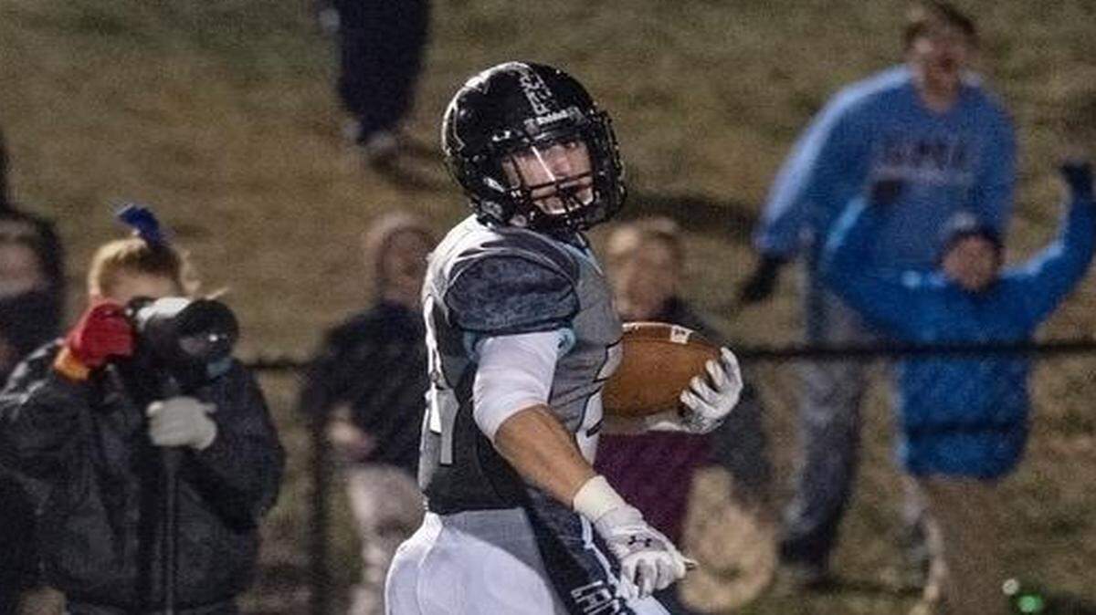 
Shawnee Mission East’s Sam Huffman looked back as he ran to the end zone for a touchdown in a Kansas 6A state semifinal game on Friday. Huffman later scored the winning two-point conversion.



