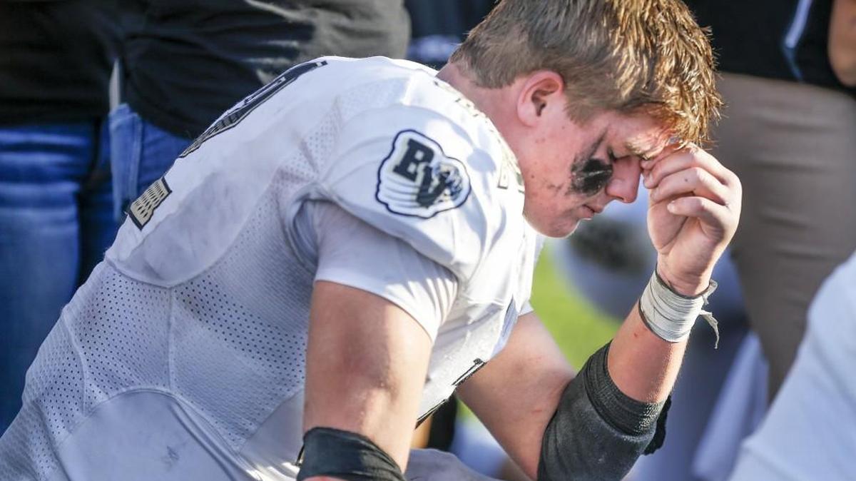 Blue Valley's Michael Maffry can’t hide his disappointment after the Tigers lose to Derby 17-14 on a late field goal in the Class 6A championship game in Emporia.