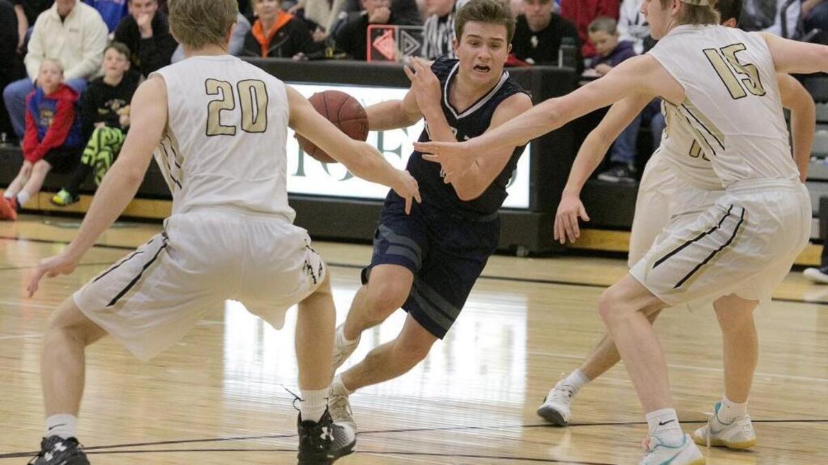 Blue Valley North’s Colby Bullock (center) was selected first-team all-conference in the Eastern Kansas League after leading his team to the Class 6A state tournament.