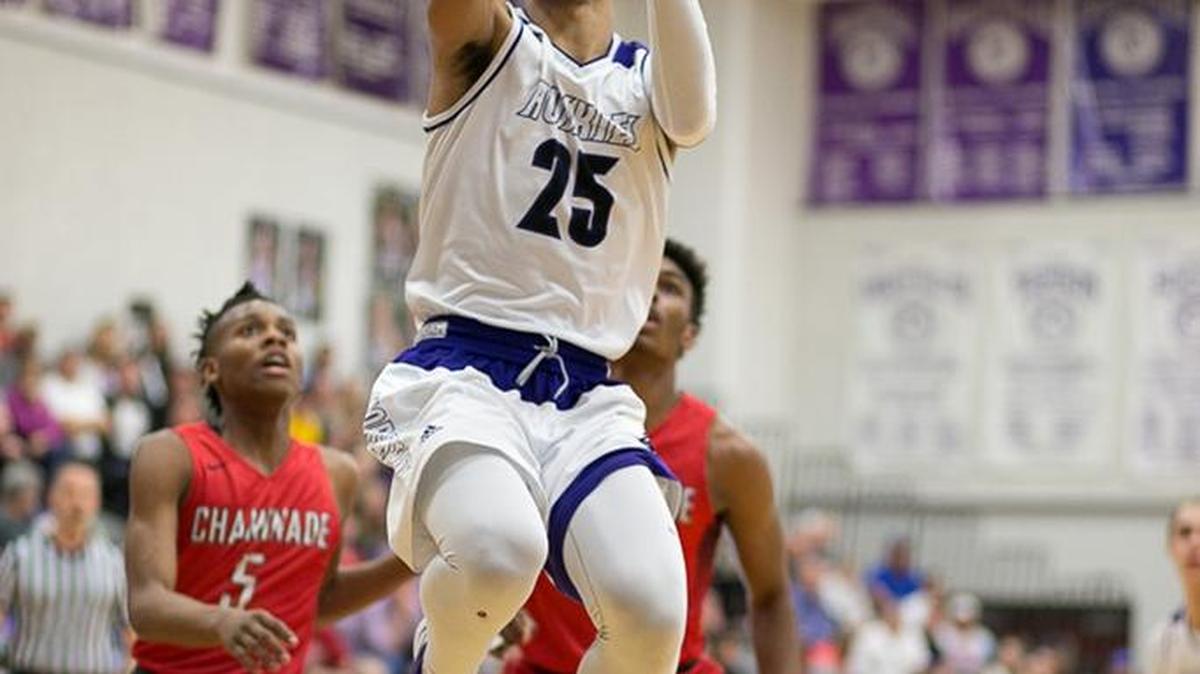 Darien Jackson of Blue Valley Northwest goes airborne for a layup against Chaminade Saturday night during the 810 Varsity Best of the Midwest Showcase. Jackson scored 30 points to lead BV Northwest to an 87-83 victory in double overtime.