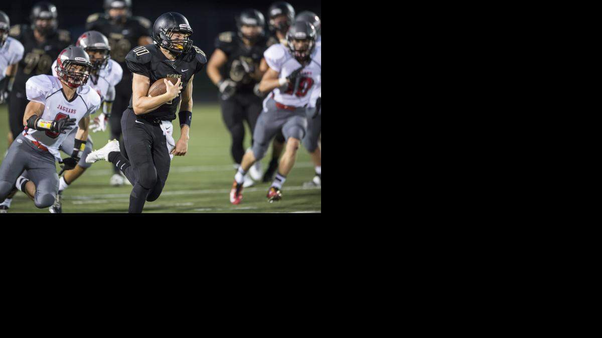 
Blue Valley junior quarterback Colton McCumber broke through the Blue Valley West for a rushing touchdown in the second quarter on Friday night.
