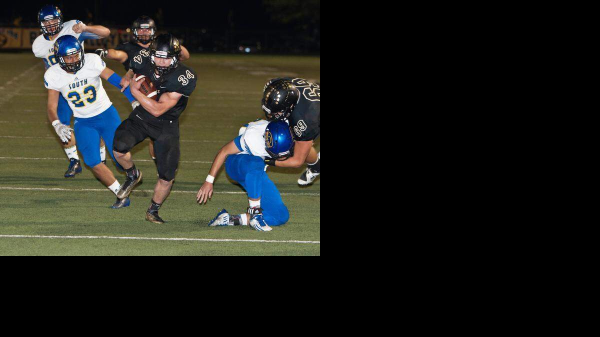 
AJ Totta of Blue Valley split the defense on his way to a touchdown against Olathe South on Oct. 24.

