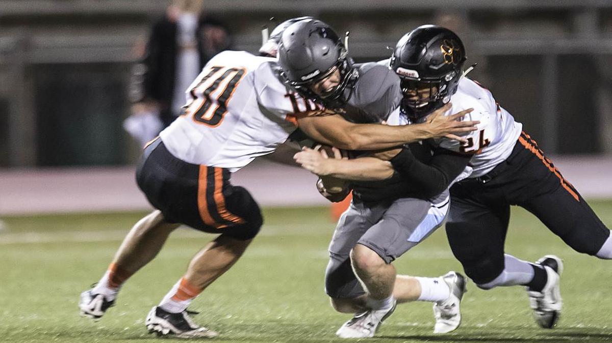 Shawnee Mission Northwest High School football player Xavier Perry, seen here in a game last season against SM East, scored a 73-yard touchdown last week against the Lancers.