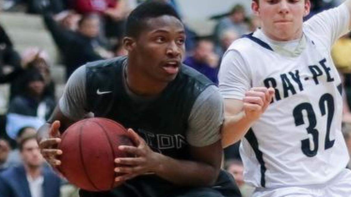 
Daren Johnson (left) of Belton looked for an opening against Raymore-Peculiar in a game earlier this season.
