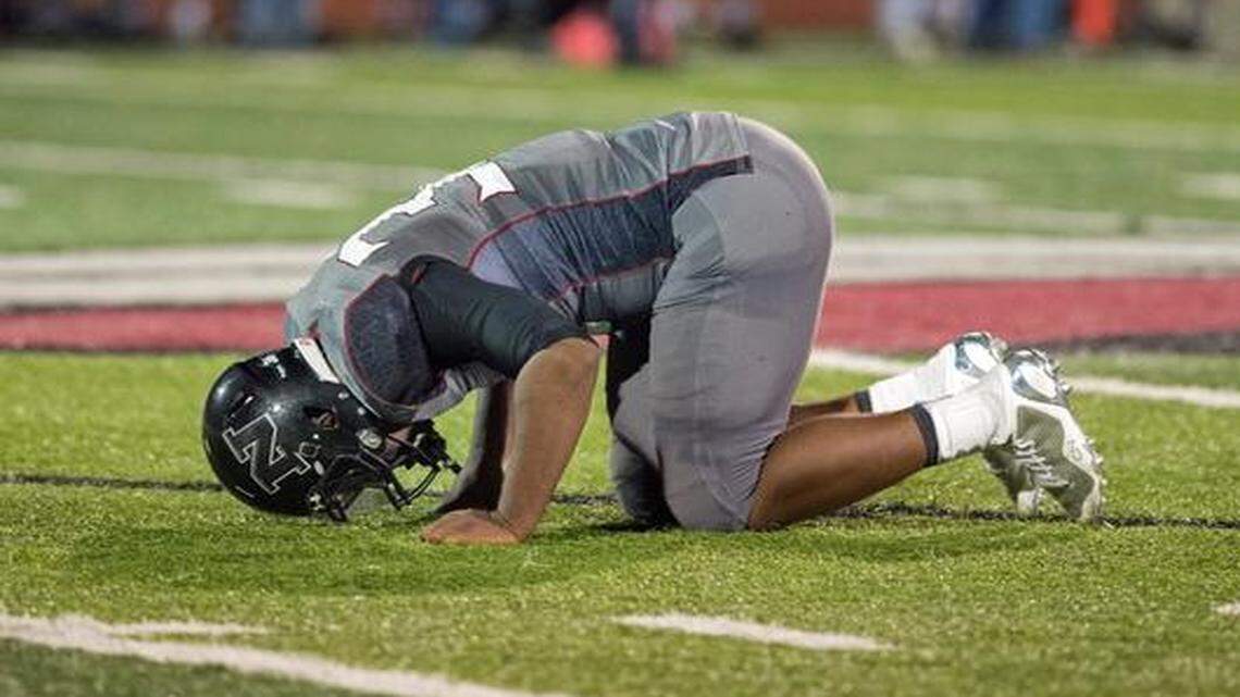 Lee’s Summit North’s Mychal Shaw was slow to get up Friday after being hit in the game against Blue Springs High. He played the remainder of the game. He is continuing his football career despite a concussion a year ago.