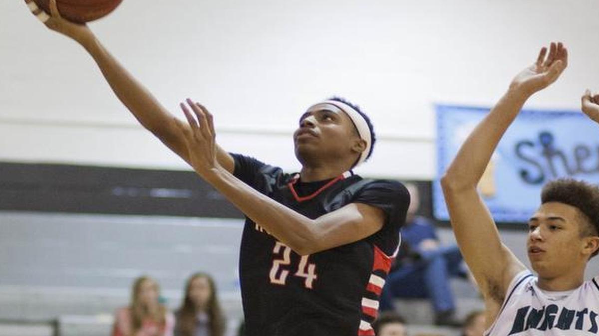 SM North’s Michael Weathers (left) and his twin brother, Marcus, said they will both play at Miami (Ohio) in college.
