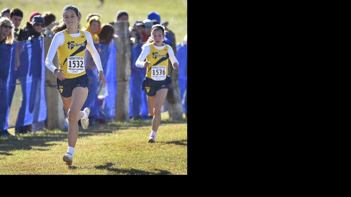 
St. Thomas Aquinas teammates Emily Downey (No. 1532) and Margaret Pigott (1536) placed first and second, respectively, in the Class 5A girls race at the Kansas cross country state meet. The Saints also won the team title.
