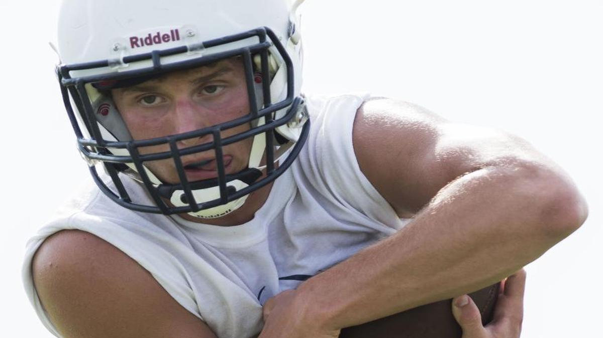 
St. James Academy tailback Jake Burgmeier, who rushed for 708 yards and four touchdowns last season, carried the football during a recent preseason practice.
