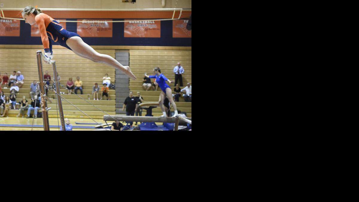 
Shannon Sewell, a senior at Olathe East High School, competed in the bars event last Thursday at the Olathe East Invitational.
