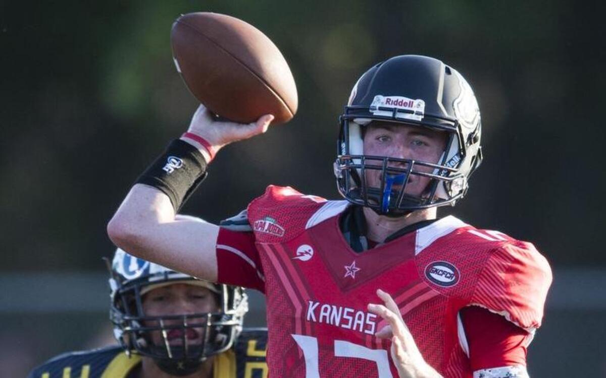 Kansas All-Stars quarterback Joey Dolan of Blue Valley North High School completed a pass in front of Missouri All-Stars linebacker Jonah Tuimaseve during last week’s Papa John’s Kansas vs. Missouri All-Star Game at Blue Springs High School.