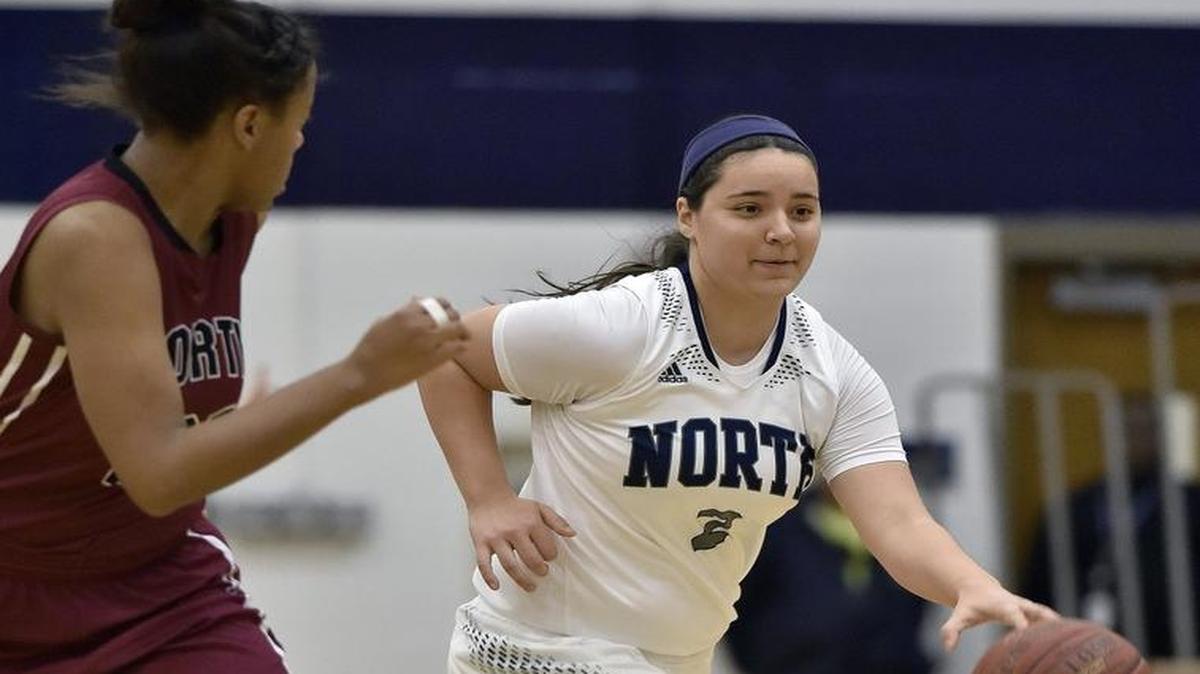 Micaela Delagarza of Blue Valley North (with ball) was selected the girls MVP in the EKL.