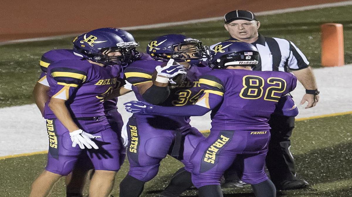 
The second half was huge for the Pirates and Zach Willis (center) Friday night at Belton High School. His teammates gathered around to celebrate his fourth of five touchdowns. 


