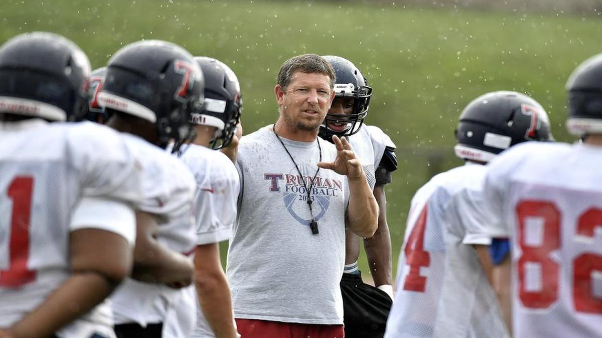 Truman football coach Gregg Webb relayed instructions during a practice on August 23, 2016, at Truman High School in Independence, Mo. Webb resigned from his position on Thursday.