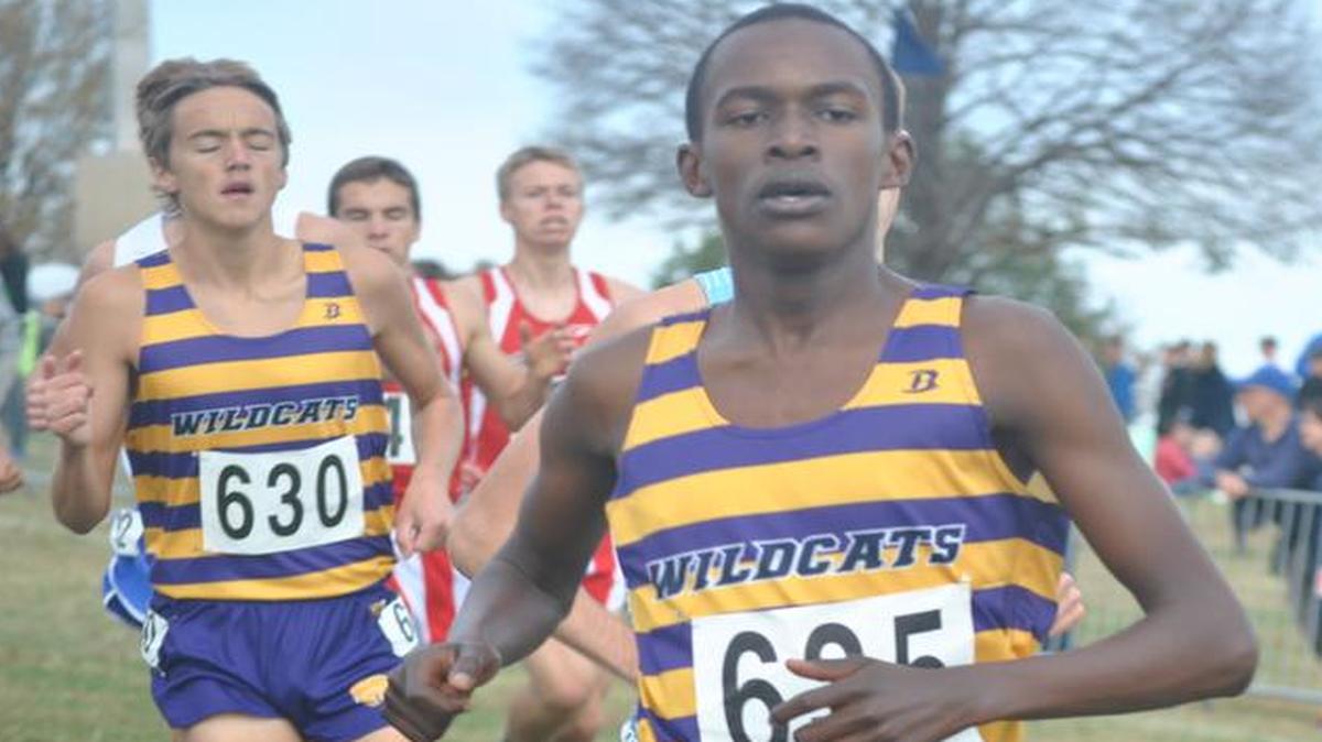 Blue Springs’ Victor Mugeche (right) finished second in the Missouri Class 4 state cross country meet Saturday in Jefferson City.
