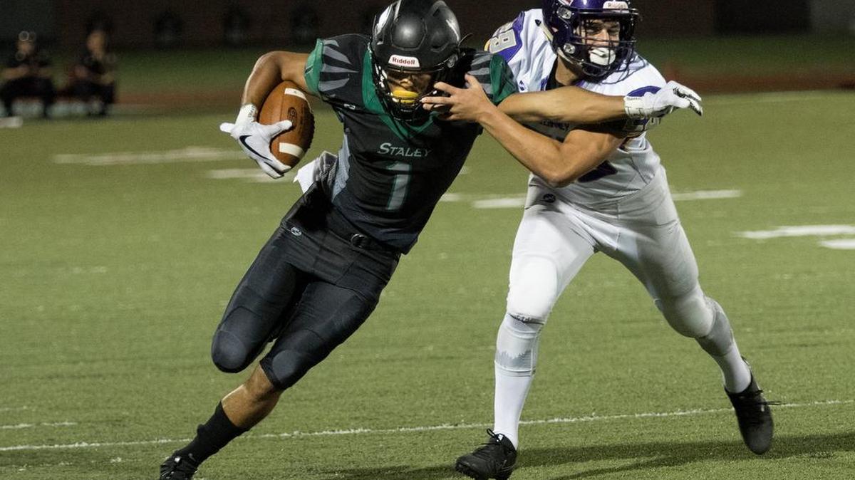 Rod Criss (left) of Staley tried for some extra yardage against Kearney on Oct. 6. Staley is 9-0 and is No. 1 in the Missouri Class 5 rankings.