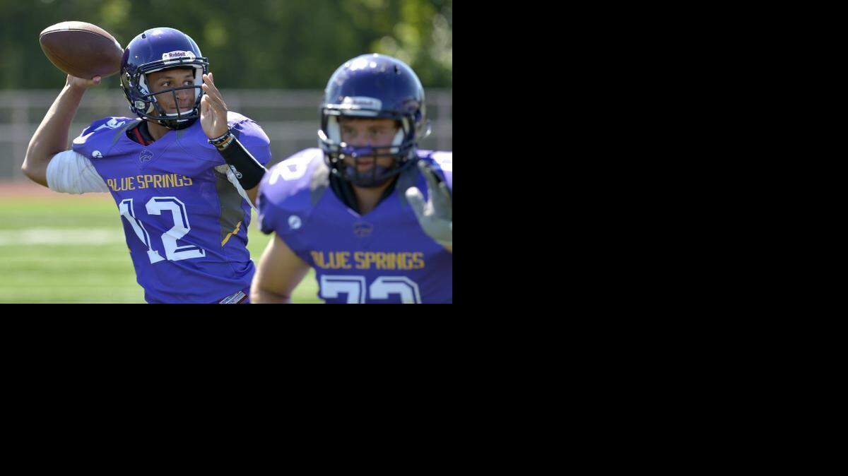 
Quarterback Ian Brown launched a pass during the a Wildcats’ workout last week at Blue Springs High School.
