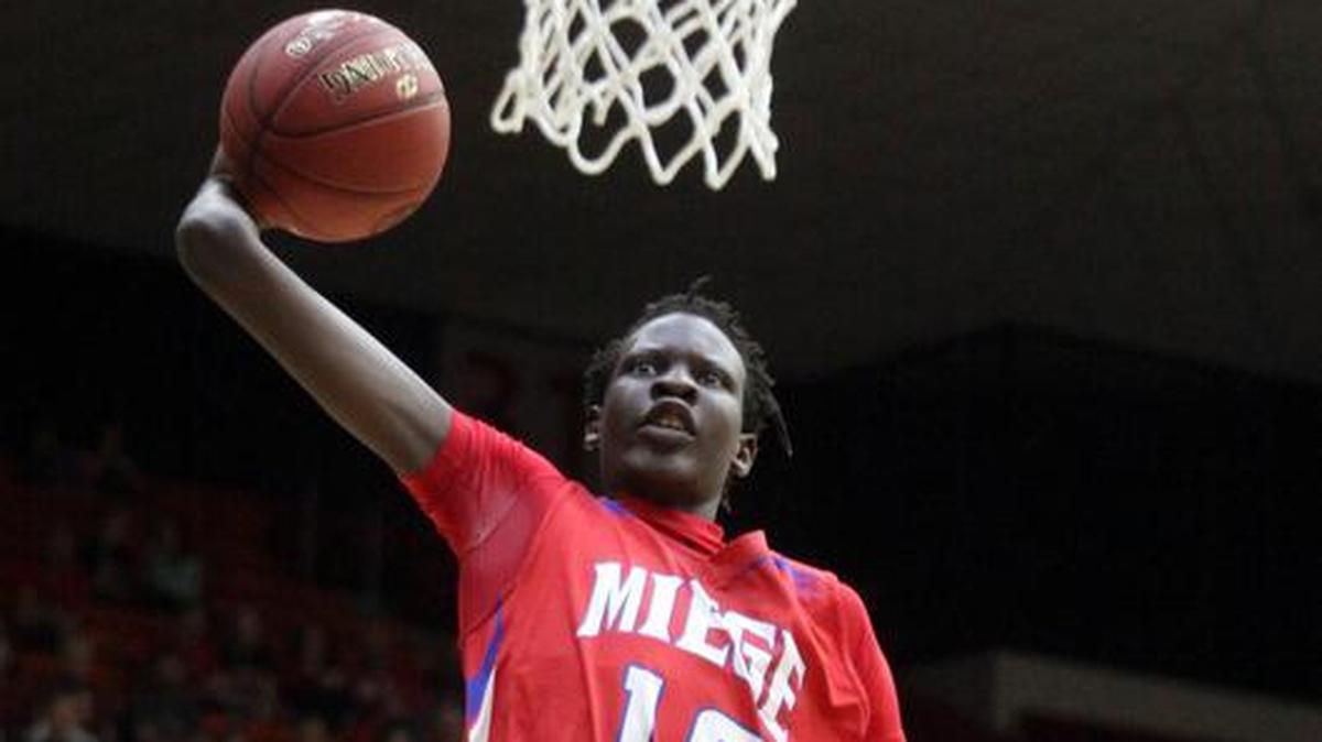 Bishop Miege’s Bol Bol goes up for a dunk during the 2016 Kansas Class 4A Division I state championship game in Salina.
