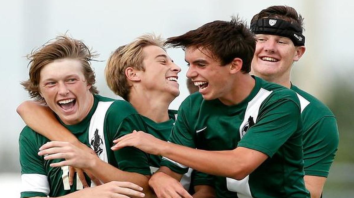 Jacob Weaver (left) celebrated with his Blue Valley Southwest teammates after he scored a goal against Gardner Edgerton in a match last year. Weaver is the Eastern Kansas League’s player of the year for the recently completed fall season